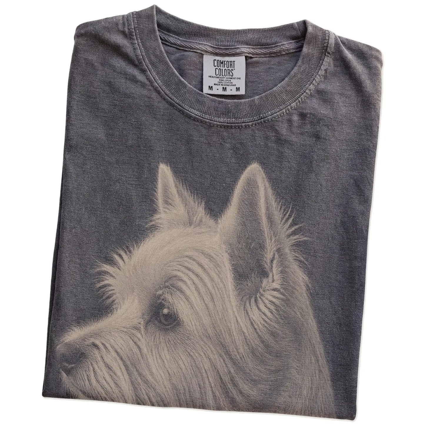 Folded Pepper Comfort Colors® T-shirt showing a detailed photographic portrait of a Westie