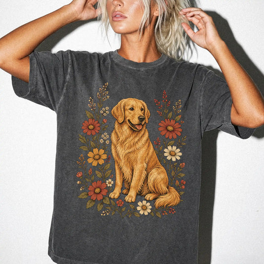 Model wearing a Pepper Comfort Colors® T-shirt showing Golden Retriever portrait surrounded by wildflowers beneath the moon