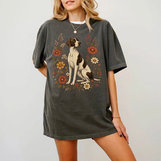 Model wearing a Pepper Comfort Colors® T-shirt showing Pointer portrait surrounded by wildflowers beneath the moon