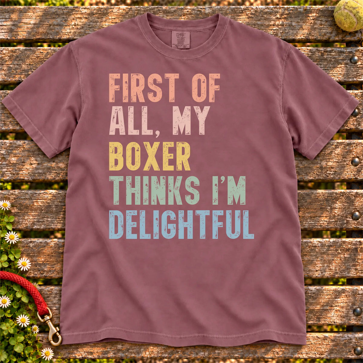 “My Boxer thinks I’m delightful” text on a Berry Comfort Colors® T-shirt
