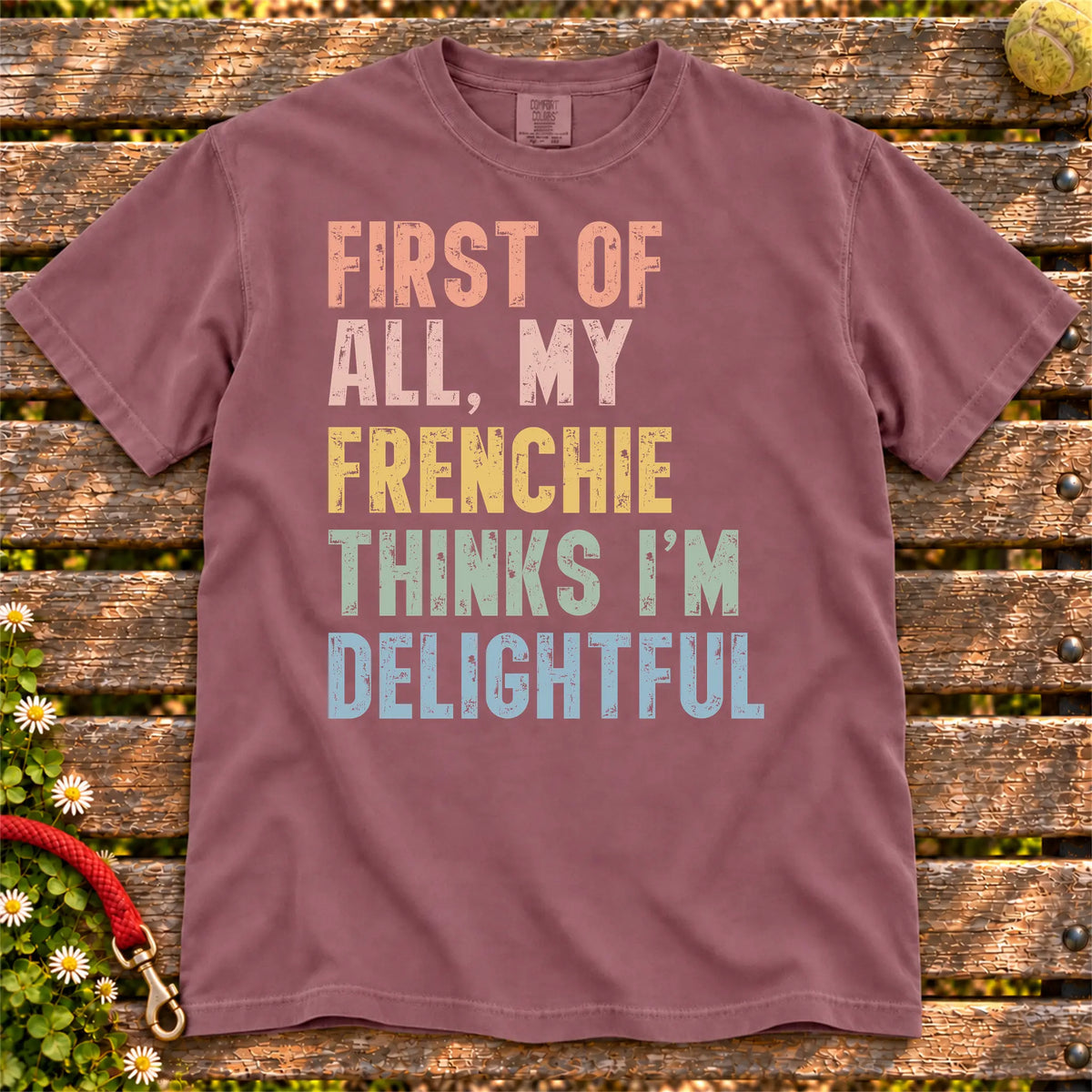 “My French Bulldog thinks I’m delightful” text on a Berry Comfort Colors® T-shirt