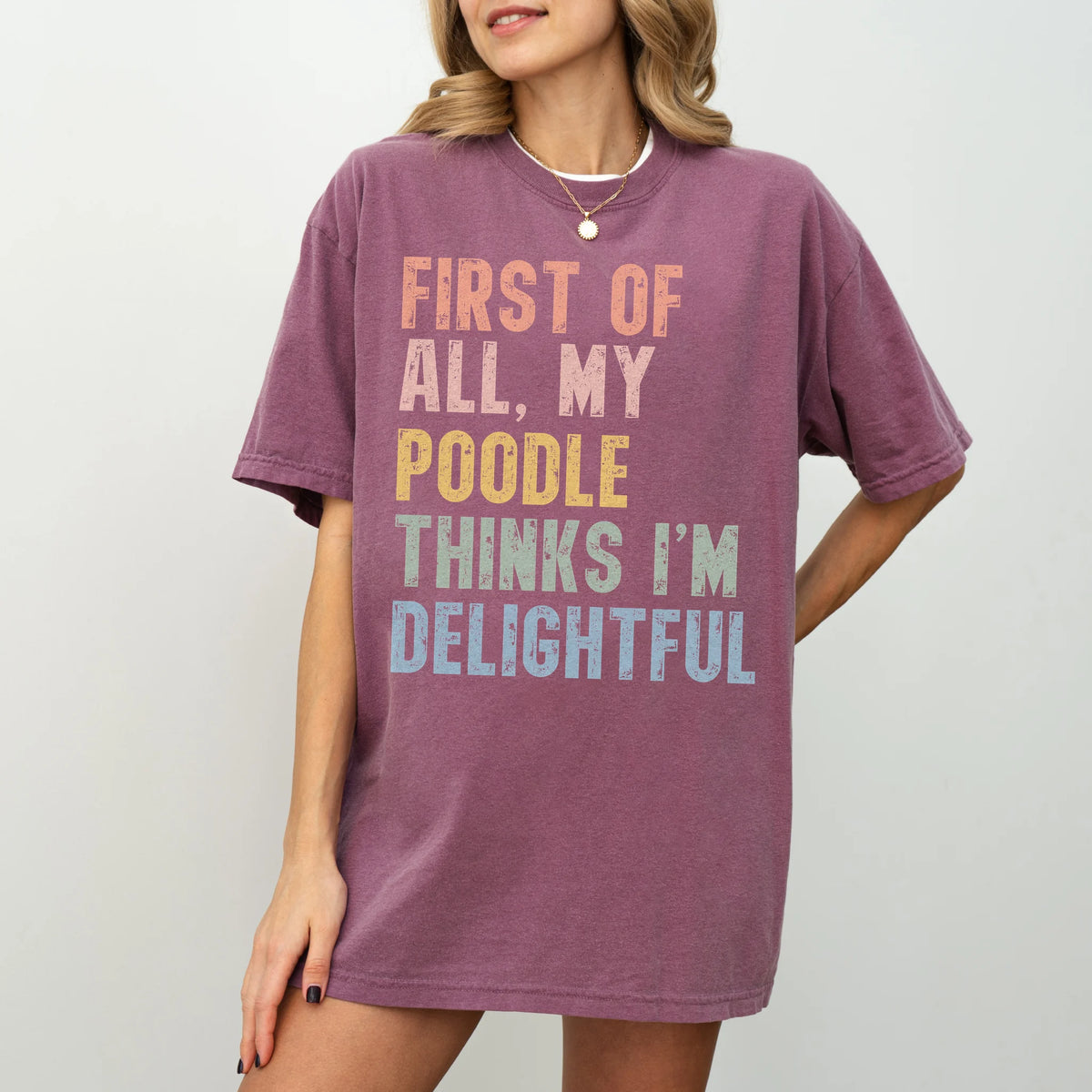 Model wearing a Berry Comfort Colors® T-shirt with “My Poodle thinks I’m delightful” text