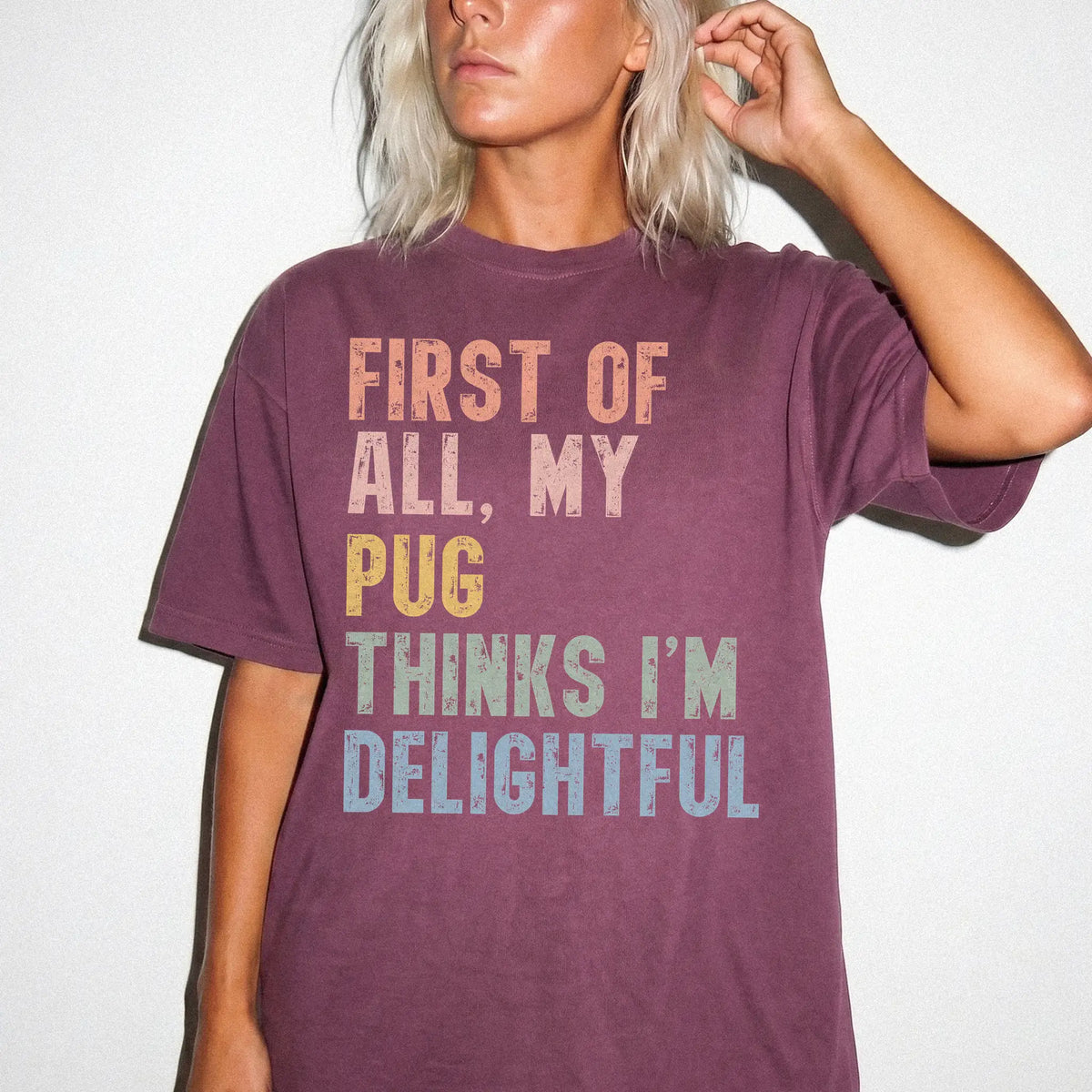 Model wearing a Berry Comfort Colors® T-shirt with “My Pug thinks I’m delightful” text