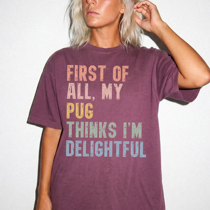 Model wearing a Berry Comfort Colors® T-shirt with “My Pug thinks I’m delightful” text