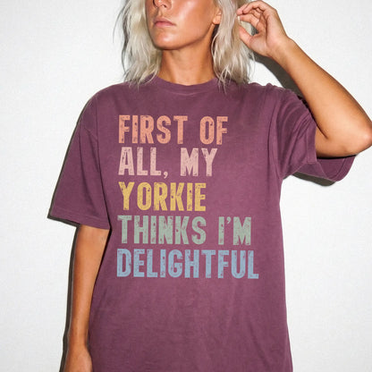 Model wearing a Berry Comfort Colors® T-shirt with “My Yorkie thinks I’m delightful” text