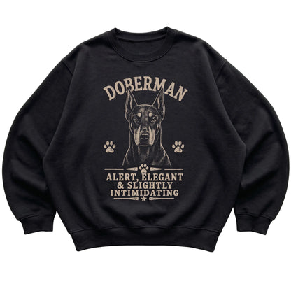 Black crewneck sweatshirt featuring Alert, Elegant & Slightly Intimidating - Doberman, laid-flat presentation