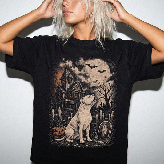Model wearing a Black Comfort Colors® T-shirt showing American Bulldog in a vintage haunted-house scene