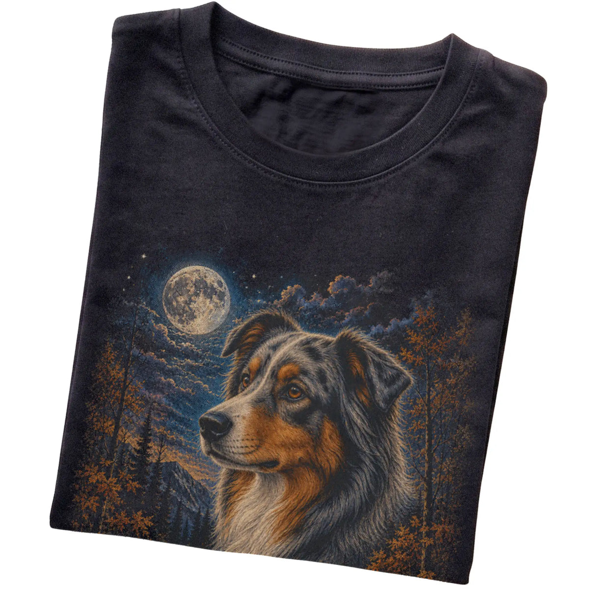 Folded black T-shirt with Australian Shepherd Autumn Moon artwork.