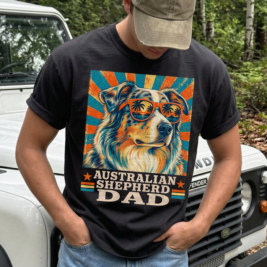 Retro Australian Shepherd Dad design on a Black Comfort Colors T-shirt worn by a model
