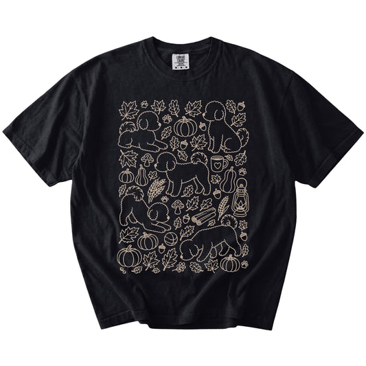 Bichon Frise dogs with pumpkins, leaves, acorns, and woodland details on a Black Comfort Colors® T-shirt