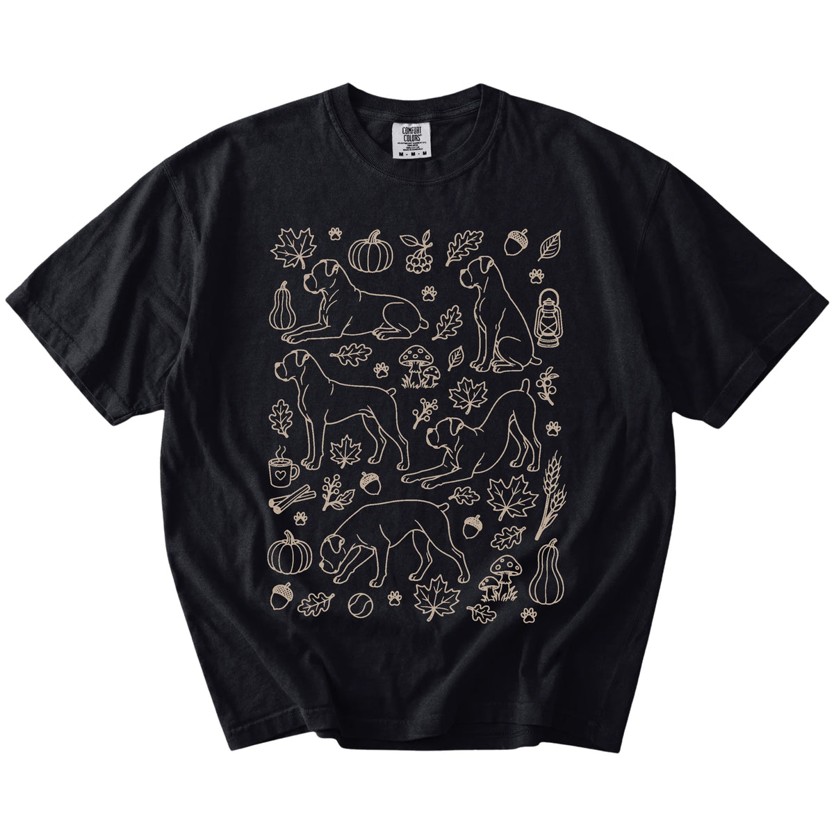 Boxer dogs with pumpkins, leaves, acorns, and woodland details on a Black Comfort Colors® T-shirt