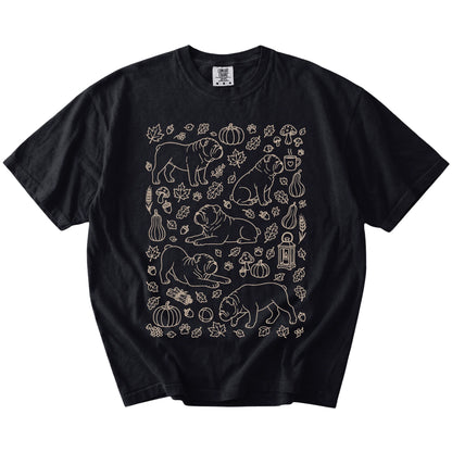 Bulldog dogs with pumpkins, leaves, acorns, and woodland details on a Black Comfort Colors® T-shirt