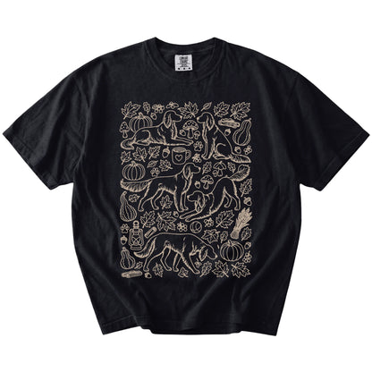 Irish Setter dogs with pumpkins, leaves, acorns, and woodland details on a Black Comfort Colors® T-shirt