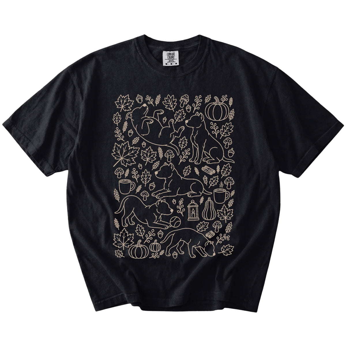 Pitbull dogs with pumpkins, leaves, acorns, and woodland details on a Black Comfort Colors® T-shirt