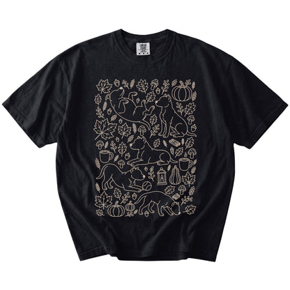 Pitbull dogs with pumpkins, leaves, acorns, and woodland details on a Black Comfort Colors® T-shirt