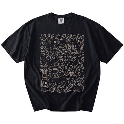 Pointer dogs with pumpkins, leaves, acorns, and woodland details on a Black Comfort Colors® T-shirt