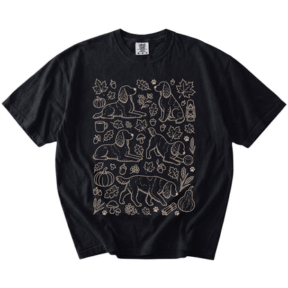 Springer Spaniel dogs with pumpkins, leaves, acorns, and woodland details on a Black Comfort Colors® T-shirt