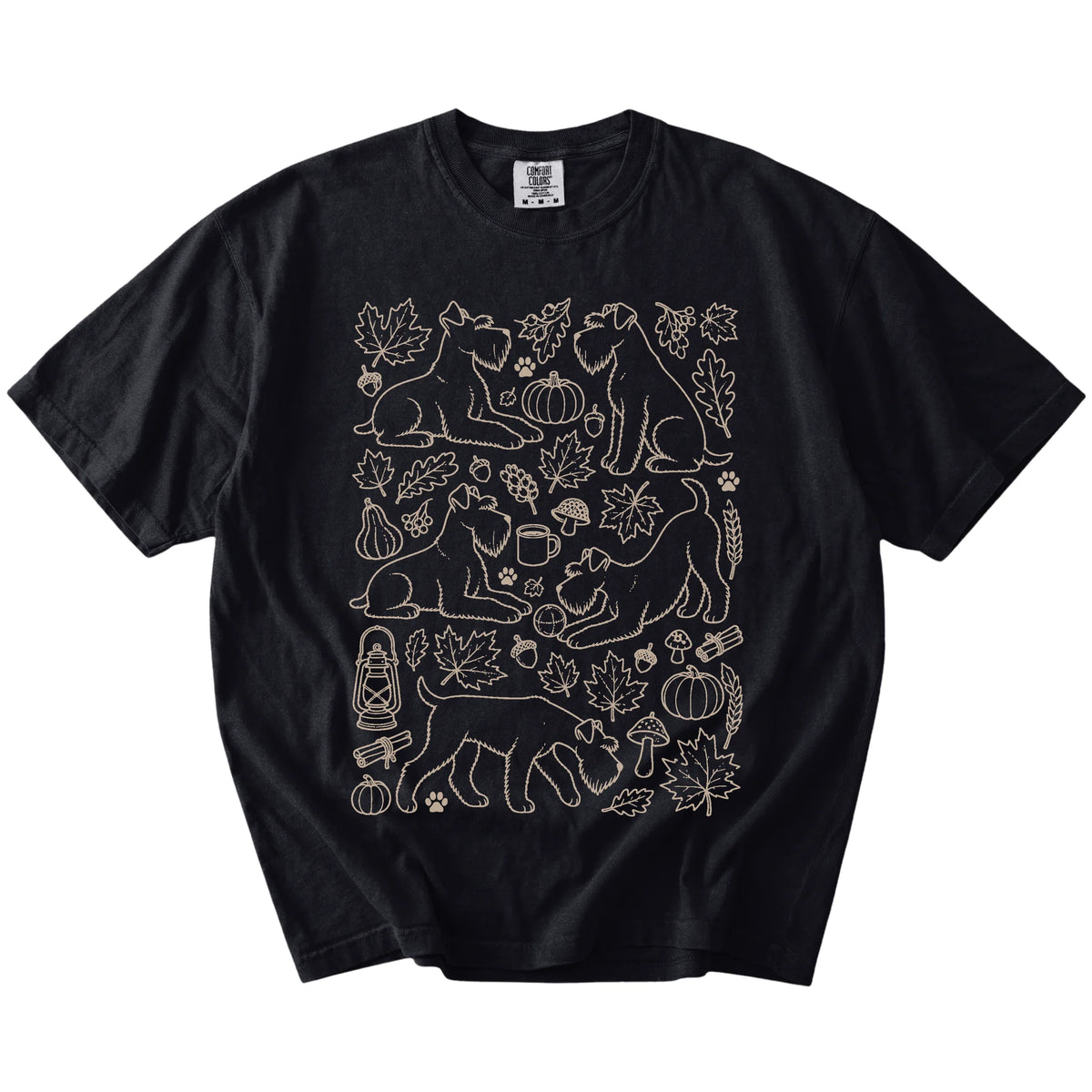 Schnauzer dogs with pumpkins, leaves, acorns, and woodland details on a Black Comfort Colors® T-shirt