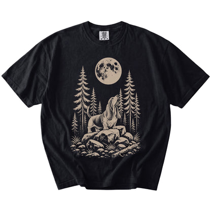 Basset Hound howling beneath the moon and pine trees on a Black Comfort Colors® T-shirt