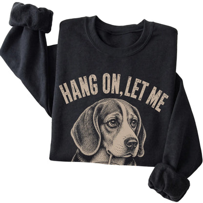 Black crewneck sweatshirt featuring Overthinking Beagle, folded presentation