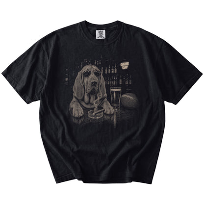 Bloodhound with beer and football graphics on a Black Comfort Colors® T-shirt