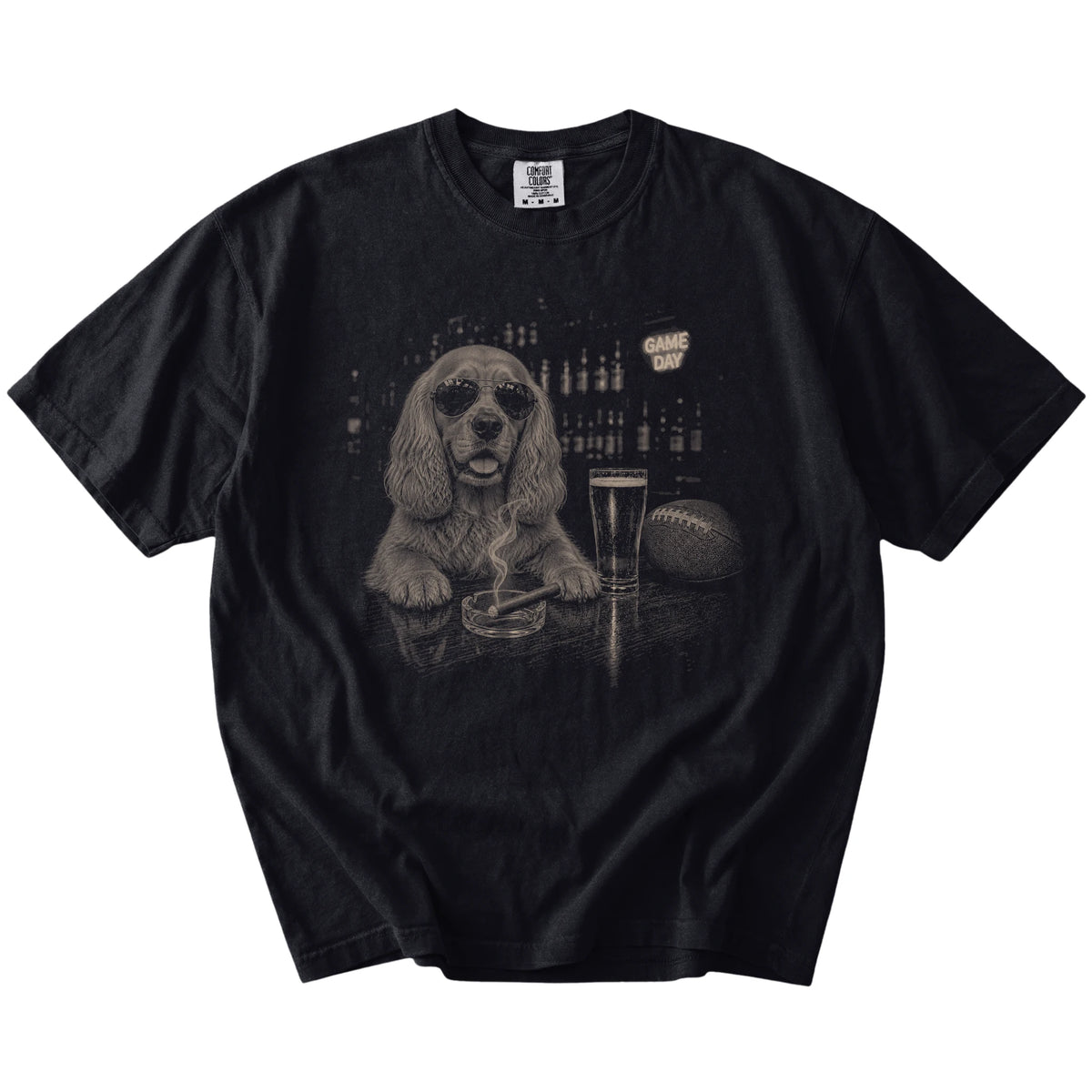 Cocker Spaniel with beer and football graphics on a Black Comfort Colors® T-shirt