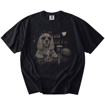 Cocker Spaniel with beer and football graphics on a Black Comfort Colors® T-shirt