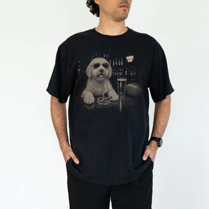 Model wearing a Black Comfort Colors® T-shirt featuring Goldendoodle with beer and football graphics