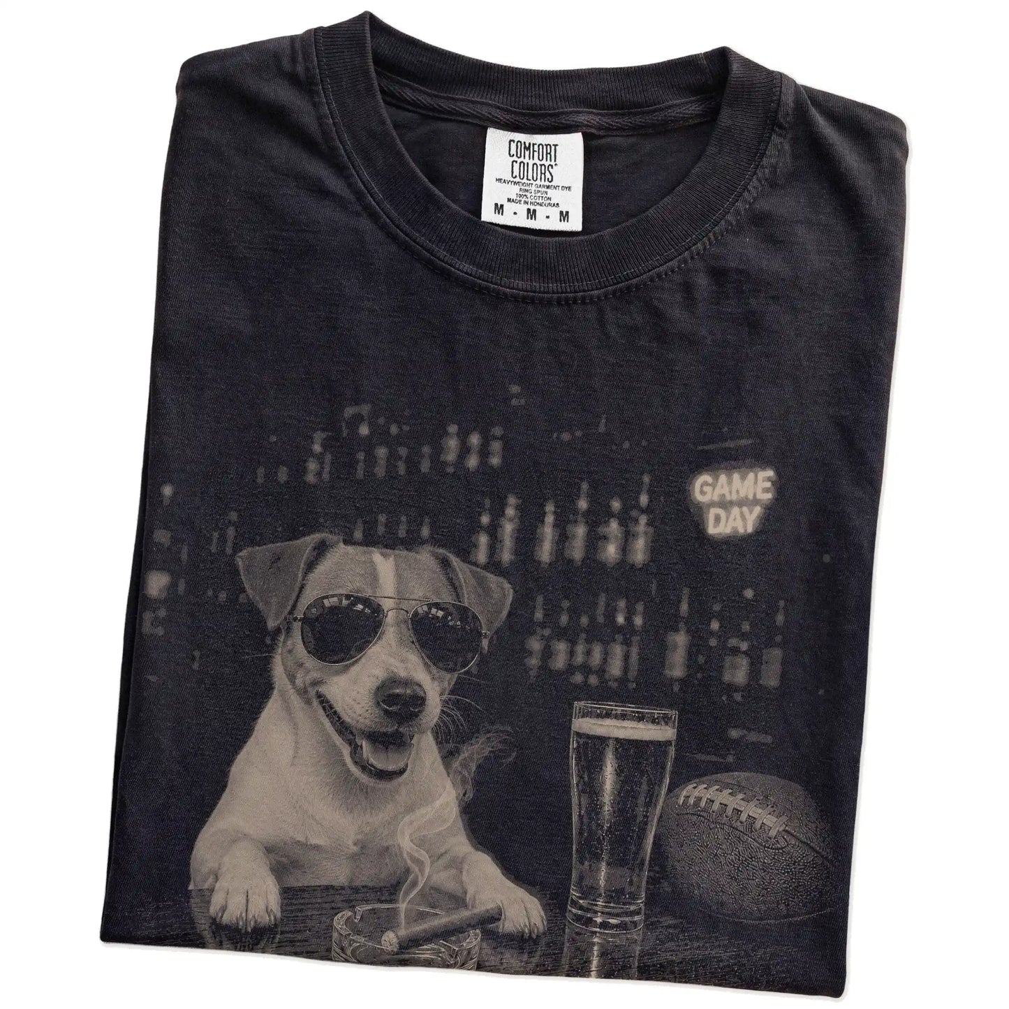 Folded Black Comfort Colors® T-shirt showing Jack Russell with beer and football graphics
