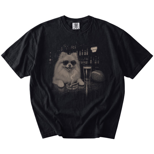 Pomeranian with beer and football graphics on a Black Comfort Colors® T-shirt