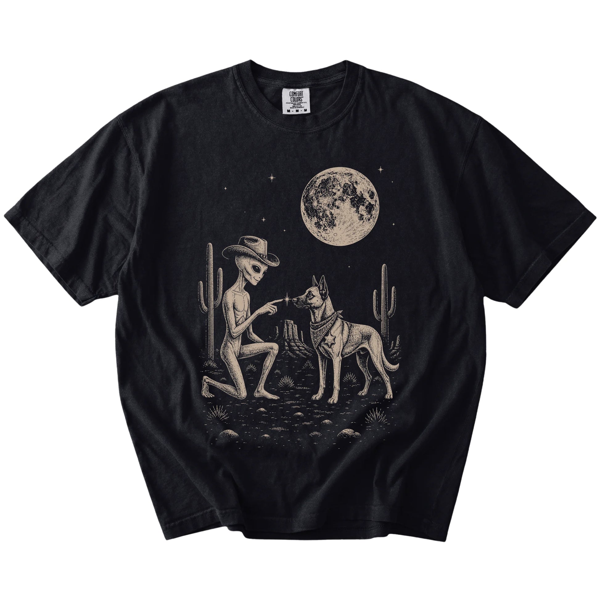 Cowboy alien fist-bumping a Belgian Malinois beneath the moon on a Black Comfort Colors® T-shirt