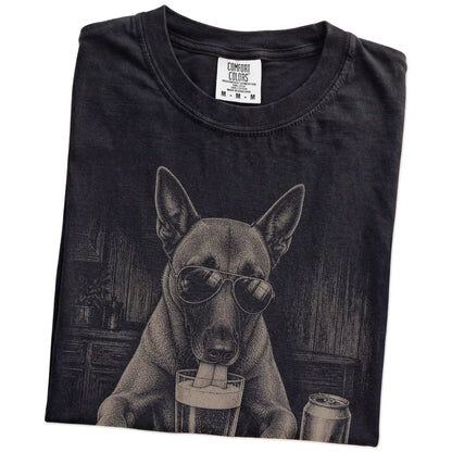 Folded Black Comfort Colors® t-shirt showing Belgian Malinois sneaking a drink from a pint