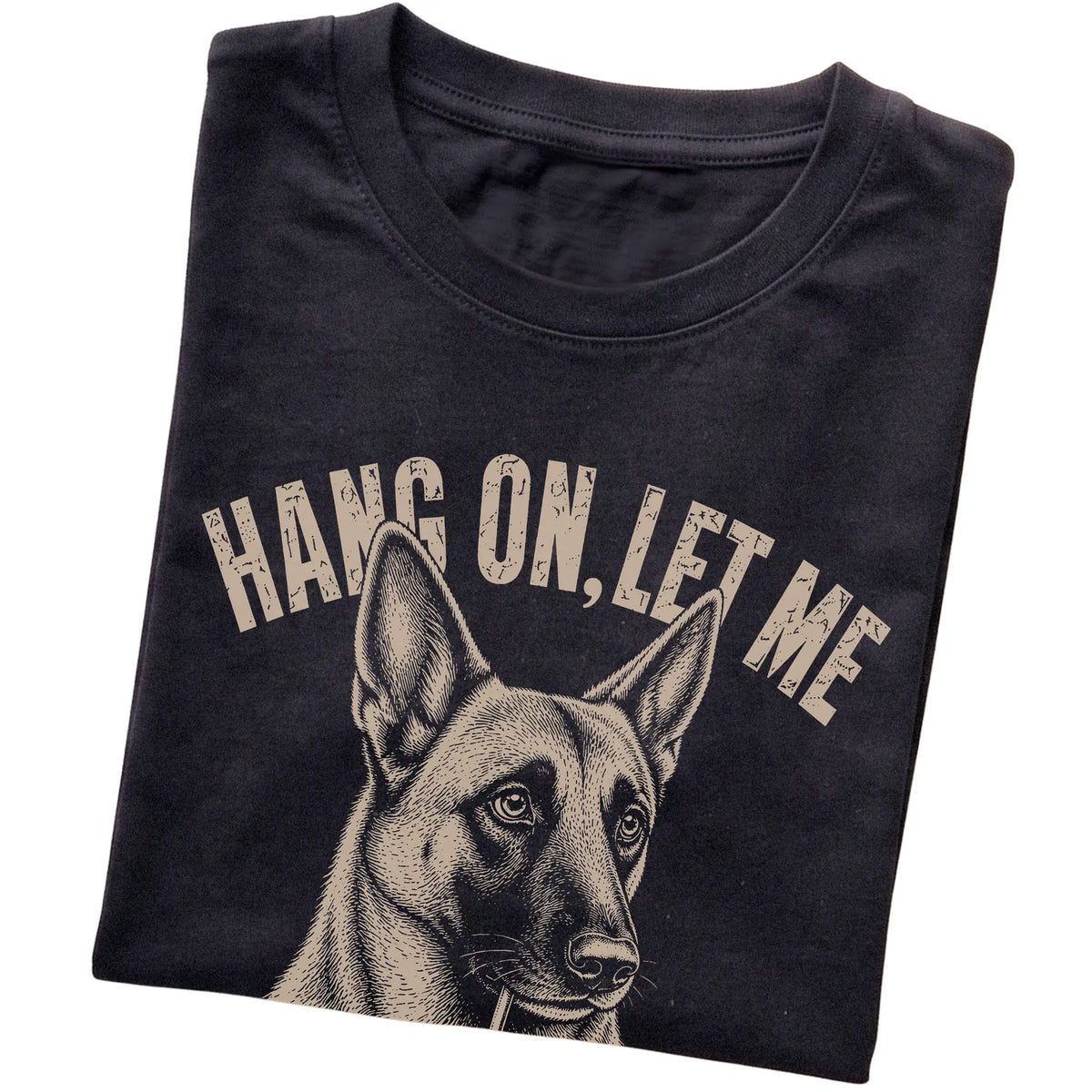 Black T-shirt featuring Overthinking Belgian Malinois, folded presentation