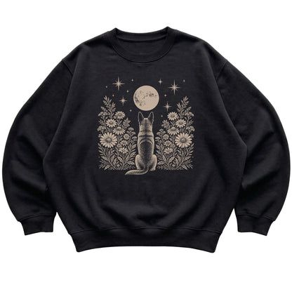 Black crewneck sweatshirt featuring Wildflower Moon Belgian Malinois, laid-flat presentation