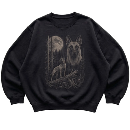 Belgian Malinois Moonlit Forest graphic on a black crewneck sweatshirt laid flat