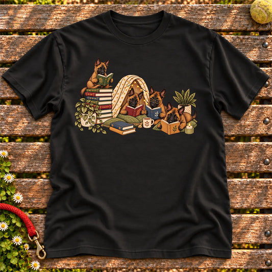 Belgian Malinois puppies reading books in a cozy blanket fort on a Black T-shirt