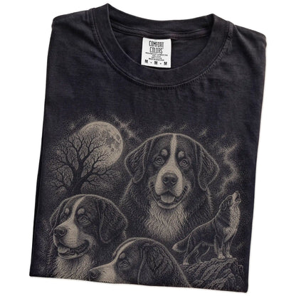 Folded Black Comfort Colors® T-shirt showing a vintage moon montage featuring Bernese Mountain Dog