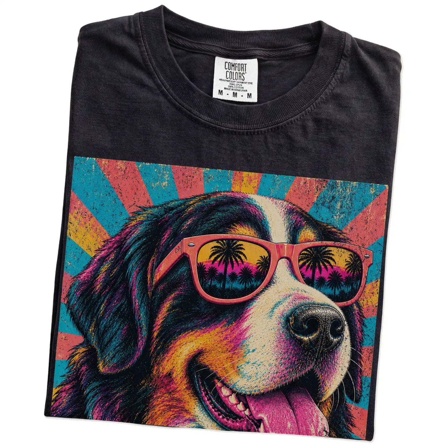 Retro Bernese Mountain Dog Mama design on a Black Comfort Colors T-shirt folded detail