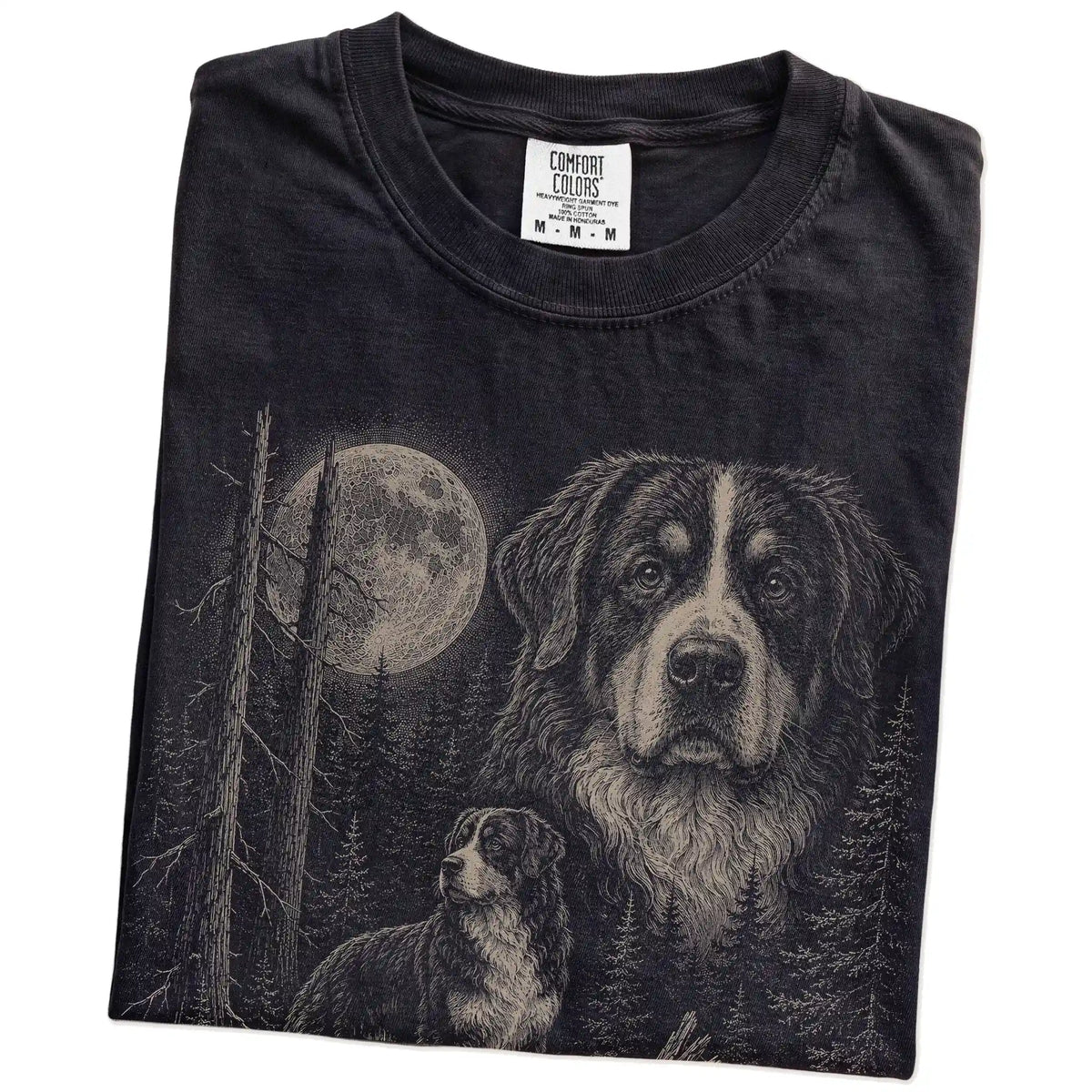 Folded Black Bernese Mountain Dog Moonlit Forest T-Shirt showing the graphic