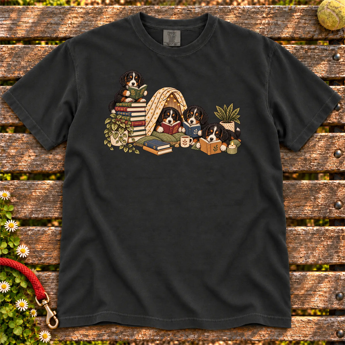 Bernese Mountain Dog puppies reading books in a cozy blanket fort on a Black T-shirt