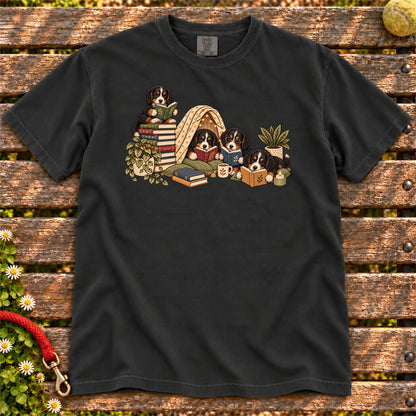 Bernese Mountain Dog puppies reading books in a cozy blanket fort on a Black T-shirt