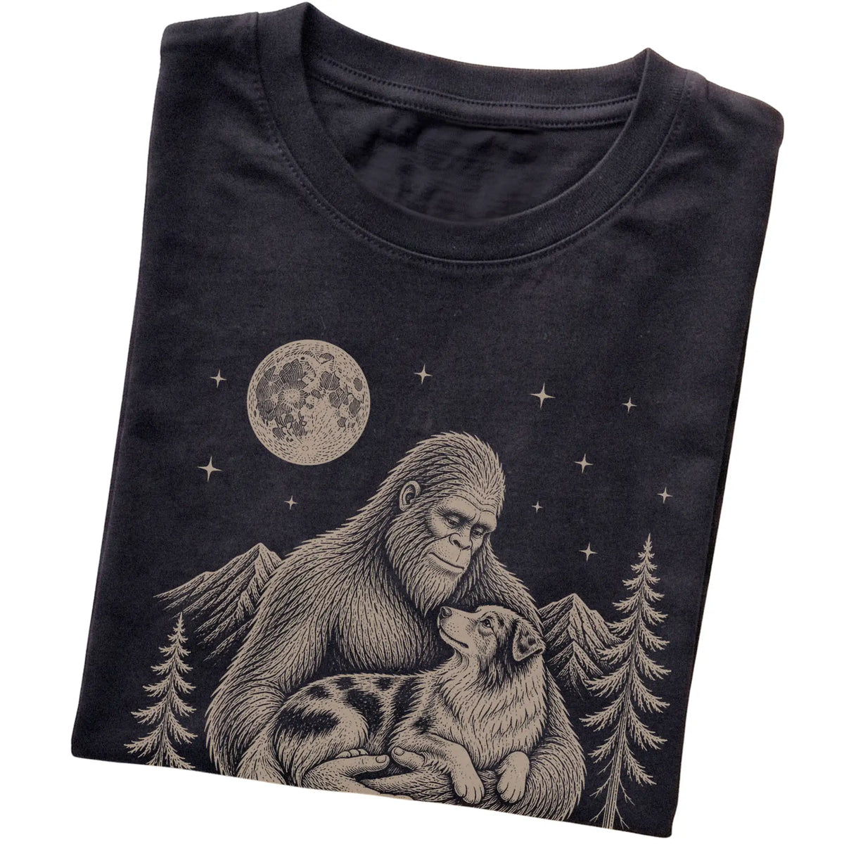 Folded Black T-shirt showing Bigfoot holding an Australian Shepherd