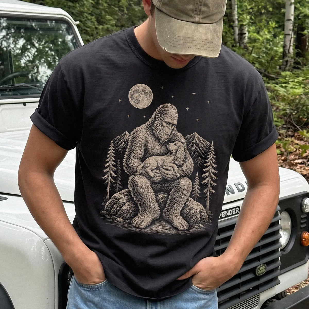 Person wearing the Bigfoot and Cocker Spaniel T-Shirt in Black