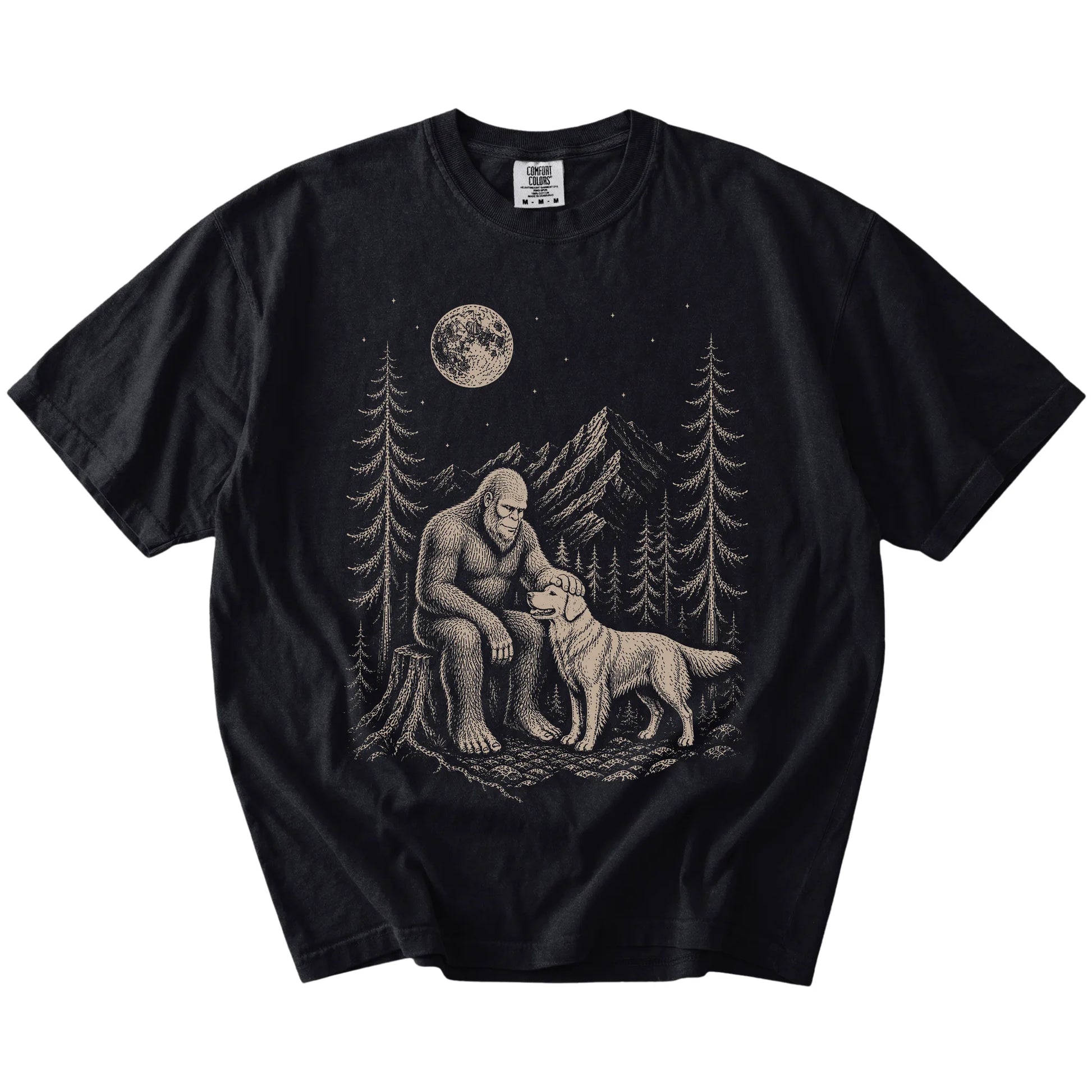 Bigfoot petting a Golden Retriever beneath the moon in a pine forest on a Black Comfort Colors® T-shirt
