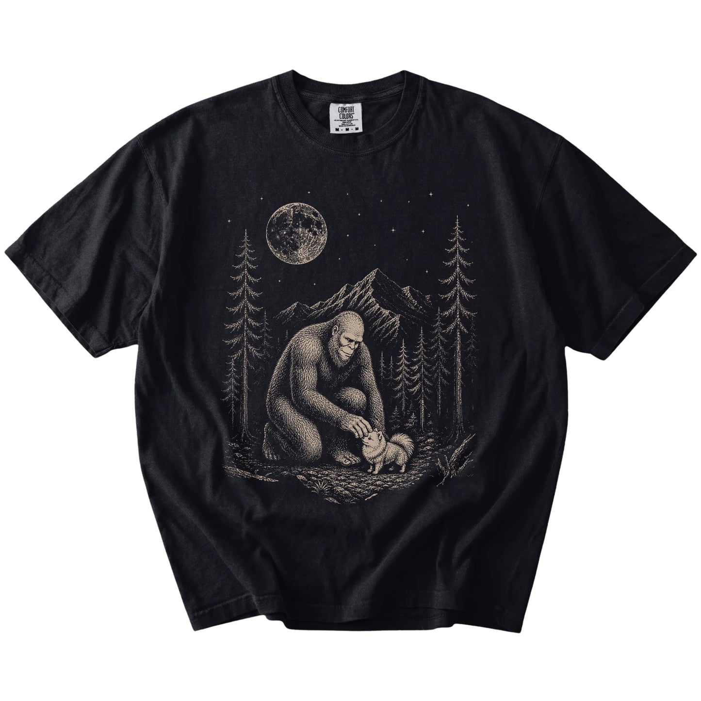 Bigfoot petting a Pomeranian beneath the moon in a pine forest on a Black Comfort Colors® T-shirt