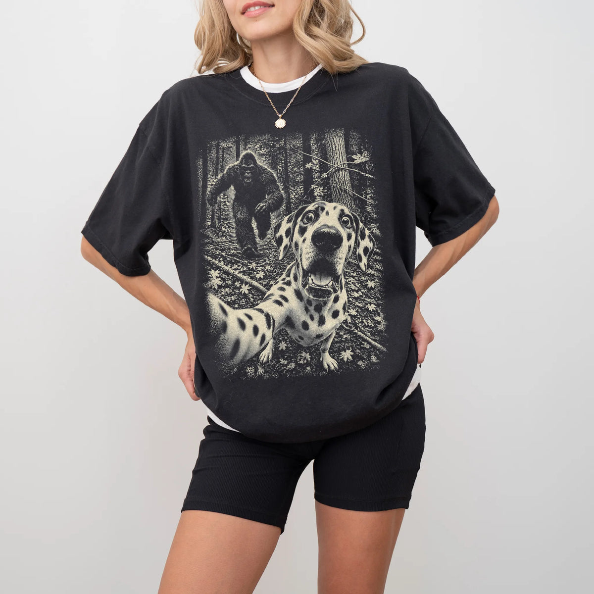 Black Dalmatian Bigfoot selfie T-shirt, worn by a model