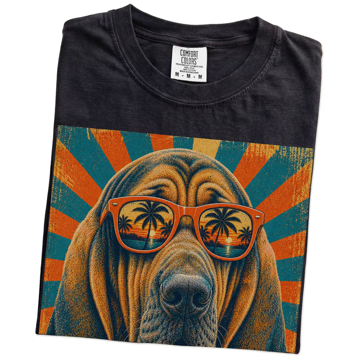 Retro Bloodhound Dad design on a Black Comfort Colors T-shirt folded detail
