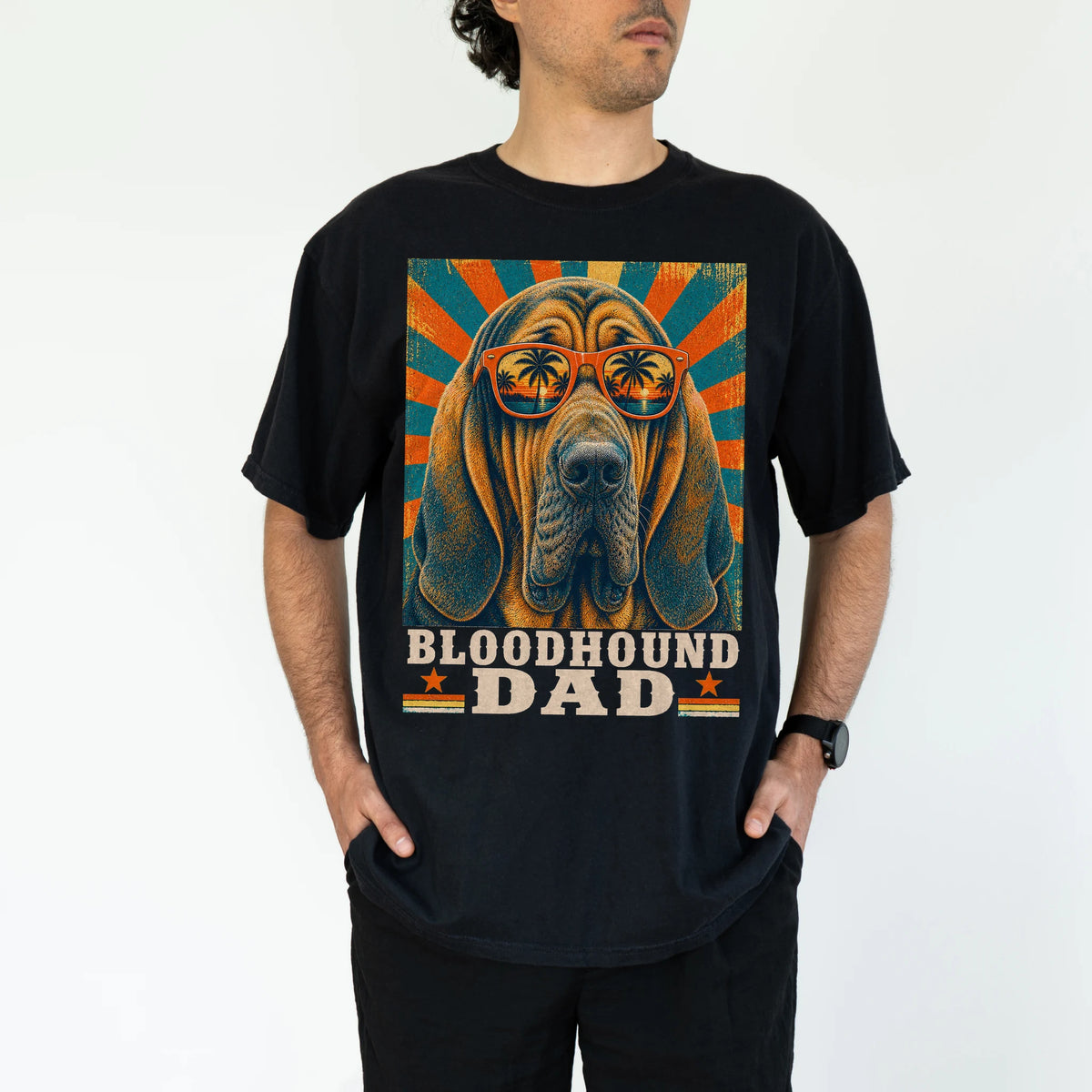 Retro Bloodhound Dad design on a Black Comfort Colors T-shirt worn by a model