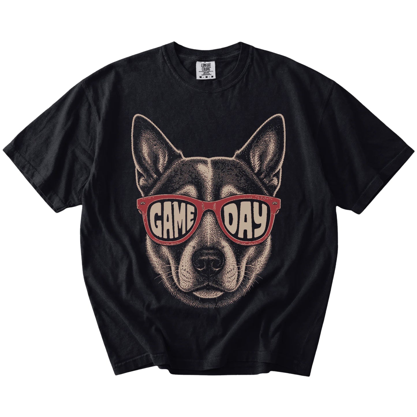 Blue Heeler wearing red Game Day sunglasses on a Black Comfort Colors® T-shirt
