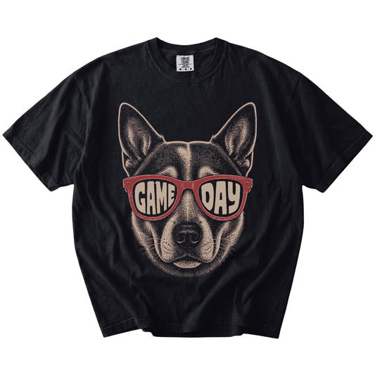 Blue Heeler wearing red Game Day sunglasses on a Black Comfort Colors® T-shirt